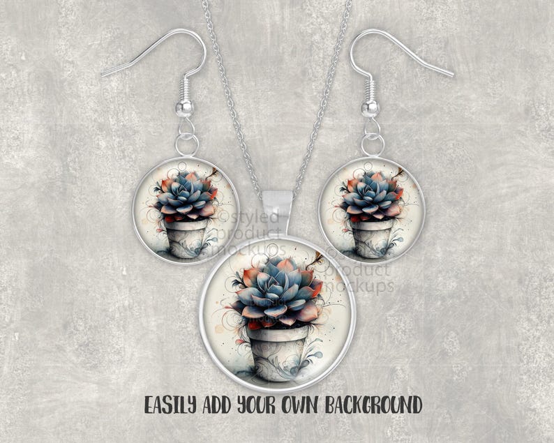 May include: A silver-coloured jewellery set comprising a pendant necklace and matching earrings. Each piece features a watercolour image of a succulent plant in a white pot. The text "EASILY ADD YOUR OWN BACKGROUND" is at the bottom.