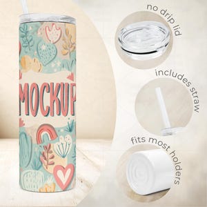 May include: A floral-patterned tumbler with a straw, featuring a design of hearts, rainbows, and plants in pastel colors. The text "MOCKUP" is displayed prominently. The lid is a no-drip design and fits most holders.