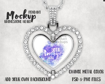 May include: Silver pendant necklace with a double heart design. The heart is encrusted with clear rhinestones and has a clear centre where you can add your own image. The pendant is on a silver chain.
