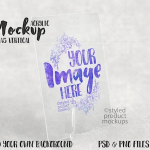A5 sized clear acrylic panel on clear acrylic stand vertical Mockup | Add your own image and background