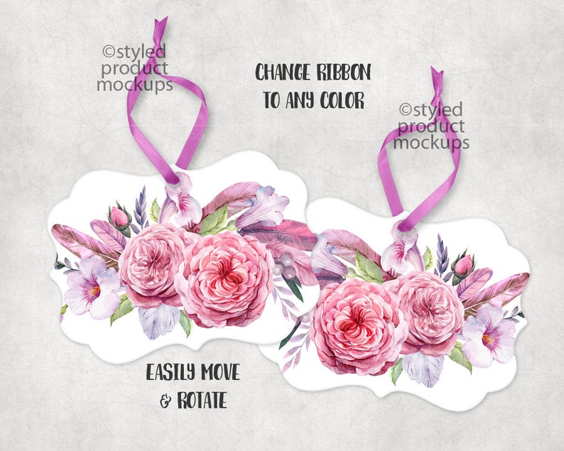 May include: Two printable gift tags with a watercolor floral design featuring pink roses, feathers, and greenery. The tags are shaped like a rounded rectangle with a hole at the top for a ribbon. The text on the tags reads "Change Ribbon to Any Color" and "Easily Move & Rotate".