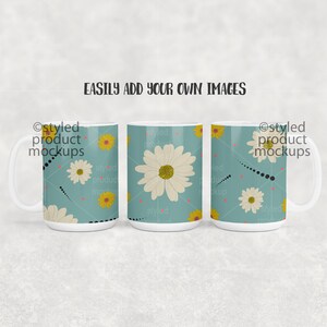 May include: Three white ceramic mugs with a blue background and a pattern of yellow and white daisies. The text "Ostyled product mockups" is printed on the mugs.