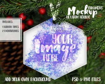 May include: A white hexagon-shaped acrylic ornament with a watercolour background in shades of blue, purple, and pink. The ornament has the text "YOUR image HERE" in white lettering. The ornament is hanging from a Christmas tree.