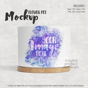 May include: A white flower pot mockup with a watercolour design featuring purple, blue, and pink colours. The text "YOUR Image HERE" is superimposed on the design. The pot has a wooden base.
