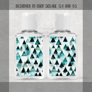 May include: Two clear plastic bottles with white caps. Each bottle has a label with a teal and blue triangle pattern. The text "DESIGNED TO CROP SQUARE. 5:4 AND 4:5" is at the top.