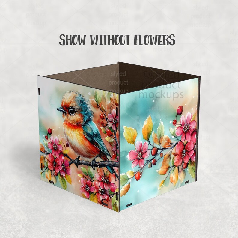 May include: A square decorative box with a watercolor painting of a colorful bird perched on a branch with pink flowers. The box has the text "SHOW WITHOUT FLOWERS" on the top.