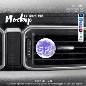 May include: A car vent air freshener mockup with a round design, featuring the letters "SPM" in a watercolor style. The image includes the text "Mockup" and "1.7" ROUND MDF". The image also includes the text "ADD YOUR IMAGE".