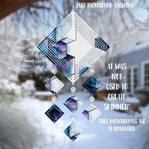 May include: A geometric wind spinner with diamond and square shapes in white, blue, and purple, strung with clear crystal beads. The text "AI WAS -NOT- USED TO CREATE SPINNER" is visible. The spinner is designed for outdoor use.