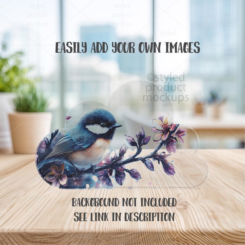 May include: A clear acrylic product mockup featuring a blue bird perched on a branch with purple flowers. The text "EASILY ADD YOUR OWN IMAGES" and "BACKGROUND NOT INCLUDED SEE LINK IN DESCRIPTION" are visible.