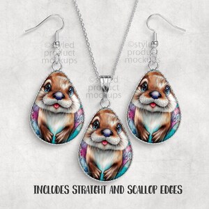 May include: A silver-toned jewelry set featuring a pendant and matching earrings. Each piece showcases a teardrop-shaped design with a detailed illustration of a cute brown animal with blue eyes and a pink tongue. The text "INCLUDES STRAIGHT AND SCALLOP EDGES" is at the bottom.