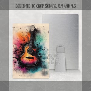 Puede incluir: Impresi&oacute;n art&iacute;stica de una guitarra ac&uacute;stica sobre un fondo de salpicaduras de acuarela coloridas. La guitarra est&aacute; representada en tonos naranja, amarillo y marr&oacute;n, con cuerdas negras y un clavijero blanco. El fondo presenta salpicaduras rosas, azules y verdes.
