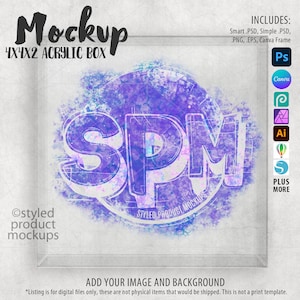 May include: A mockup of a clear acrylic box with a watercolor background. The box is 4x4x2 inches and has a stylized product mockup inside. The text "SPM!" is visible in the mockup.