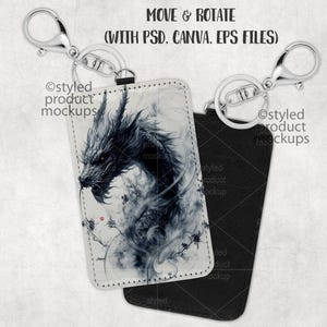 May include: A black and white illustration of a dragon on a white key chain with a black leather backing. The key chain has a silver metal ring and clasp. The text "Ostyled product mockups" is printed on the leather backing.