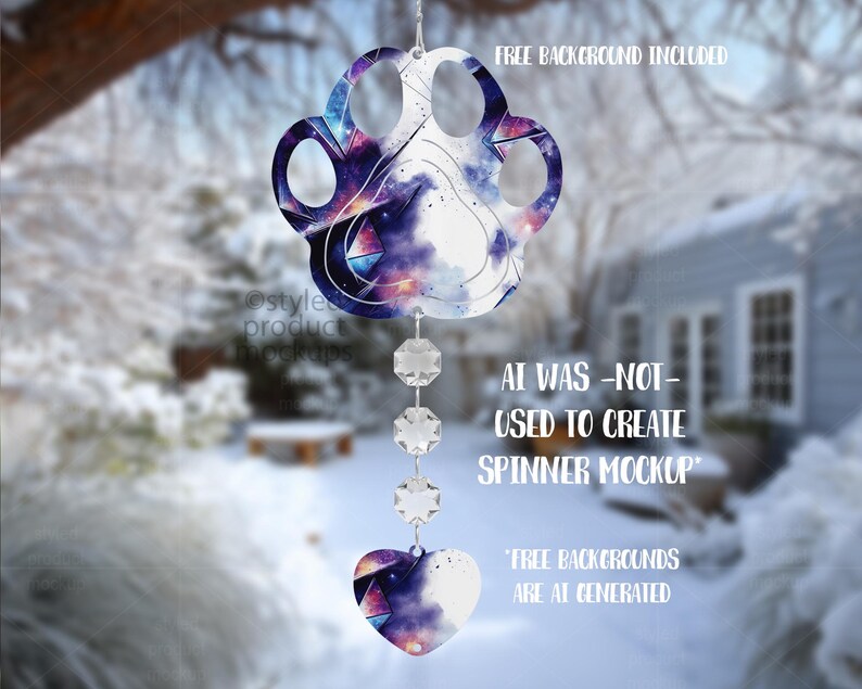 May include: A paw-shaped ornament with a galaxy design, suspended by crystal beads and a heart charm. The ornament features text: "FREE BACKGROUND INCLUDED" and "AI WAS -NOT- USED TO CREATE SPINNER MOCKUP".
