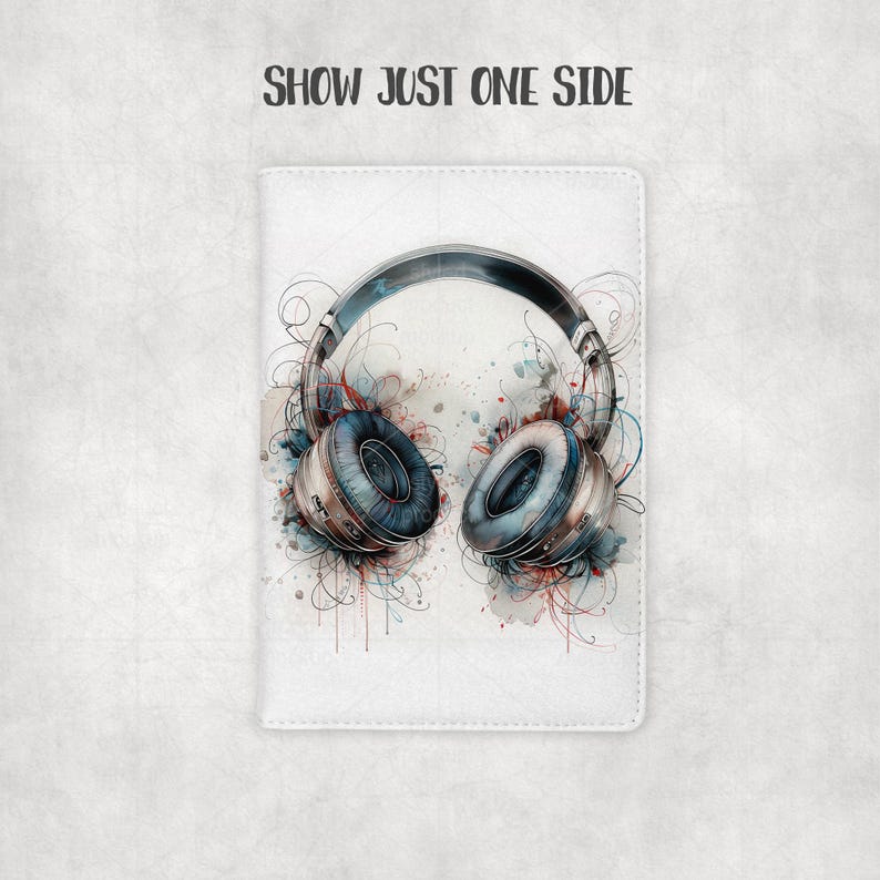May include: White notebook cover featuring a watercolor illustration of headphones. The headphones are silver and blue, with artistic paint splatters in red, blue, and gray. The text "SHOW JUST ONE SIDE" is at the top.