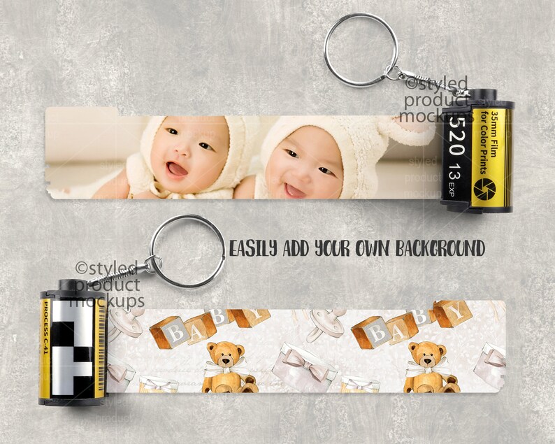 May include: A keychain with a film strip design. One strip features a photo of a smiling baby, the other has baby-themed illustrations. A film canister is attached. The text "EASILY ADD YOUR OWN BACKGROUND" is visible.