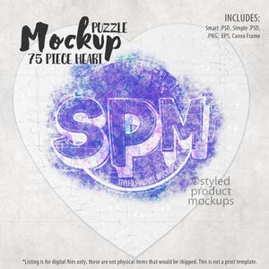 May include: A white heart-shaped puzzle with 75 pieces. The puzzle is designed to be used as a mockup for a logo or design. The puzzle is surrounded by a watercolor-like background with purple and blue hues. The text "SPM" is visible in the center of the puzzle.