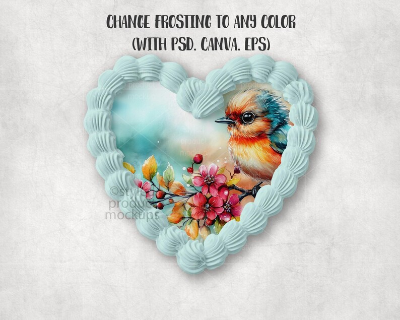 May include: A heart-shaped design with light blue frosting, framing a colorful bird and floral illustration. The bird has orange, blue, and red feathers. The text at the top says "CHANGE FROSTING TO ANY COLOR (WITH PSD. CANVA. EPS)".