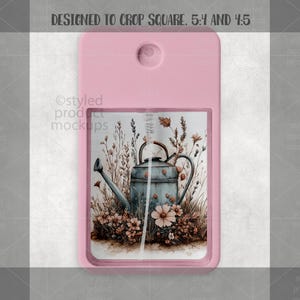 May include: A pink rectangular hand sanitizer spray bottle. The bottle features a watercolor design of a blue watering can surrounded by flowers and plants. The text "DESIGNED TO CROP SQUARE. 5:4 AND 4:5" is at the top.