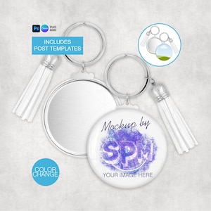 May include: A mockup of a round keychain with a silver ring and a white tassel. The keychain has a white surface with the text "Mockup by SPM YOUR IMAGE HERE" in a purple and blue design. The image also includes the text "INCLUDES POST TEMPLATES" and "COLOR CHANGE".