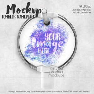 May include: A white round tumbler nameplate mockup with a silver ring and a blue and purple watercolor design. The text "YOUR IMAGE HERE" is written in a purple font on the nameplate.