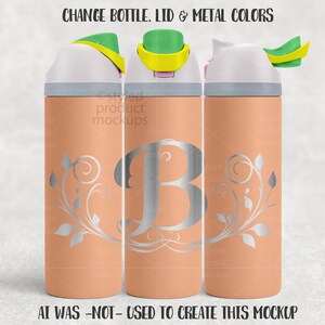 May include: Three peach-coloured water bottles with white lids and silver accents. The bottles feature a silver floral design and a large silver letter "B". The lids have green and yellow accents. The text "CHANGE BOTTLE. LID & METAL COLORS" is at the top.