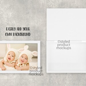 May include: A white rectangular product mockup with a framed photo of two babies wearing bunny hats. The text "EASILY ADD YOUR OWN BACKGROUND" is above the frame. A second open white box is to the right. The words "styled product mockups" are in the lower right.