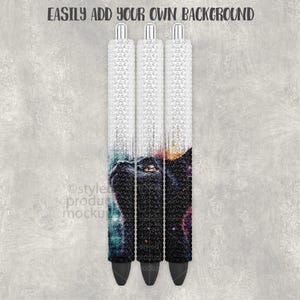 May include: Three pens with a black cat design. The pens have a white, textured upper barrel and a black tip. The cat design features a black cat with a yellow eye and a colourful galaxy-like background. The text "EASILY ADD YOUR OWN BACKGROUND" is at the top.