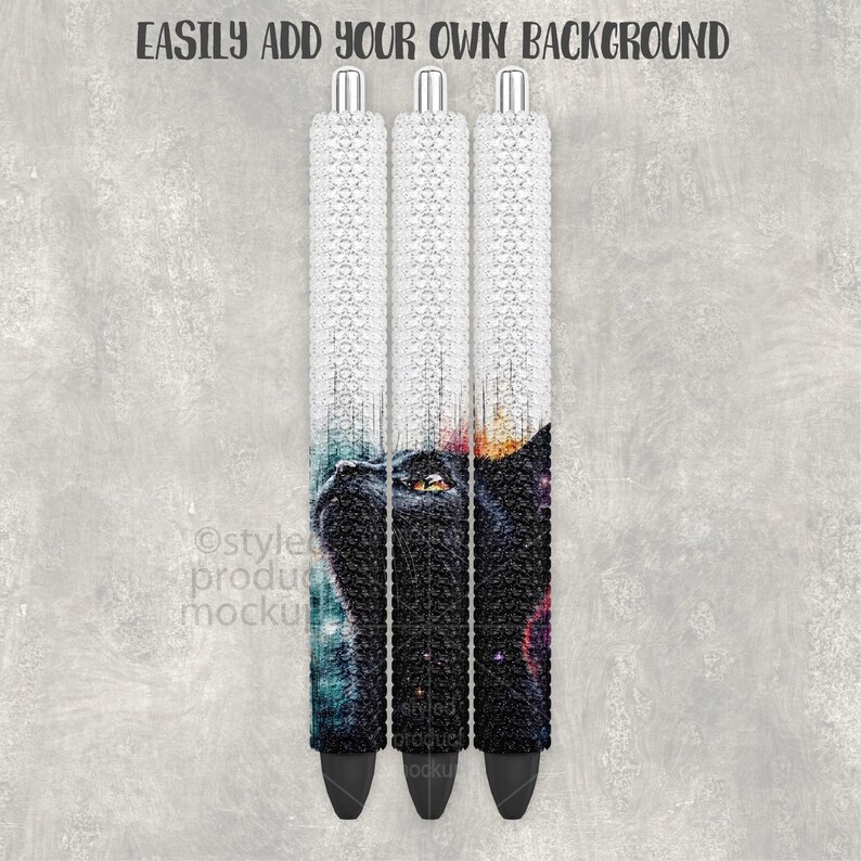 May include: Three pens with a black cat design. The pens have a white, textured upper barrel and a black tip. The cat design features a black cat with a yellow eye and a colourful galaxy-like background. The text "EASILY ADD YOUR OWN BACKGROUND" is at the top.