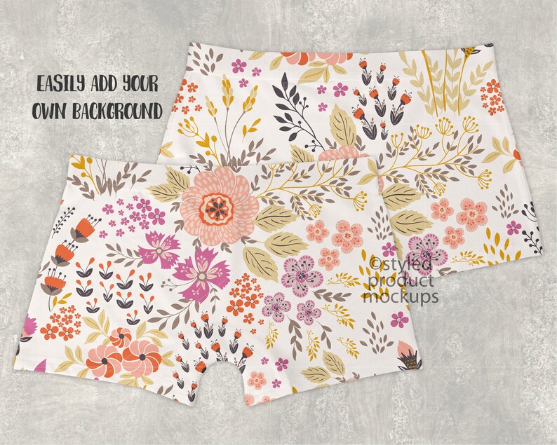 May include: Two pairs of white boxer shorts with a floral print featuring pink, orange, and yellow flowers. The text "EASILY ADD YOUR OWN BACKGROUND" is visible in the top left corner of the image.