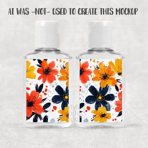 May include: Two clear hand sanitizer bottles with white caps. Each bottle has a label with a floral design featuring orange, yellow, and navy blue flowers on a white background. The text "AI WAS -NOT- USED TO CREATE THIS MOCKUP" is at the top.