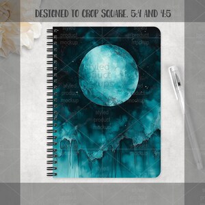 May include: Spiral-bound notebook featuring a teal and black watercolor design with a large, textured teal moon. The notebook has a black spiral binding and a pen is placed to the right. The text "DESIGNED TO CROP SQUARE. 5:4 AND 4:5" is at the top.