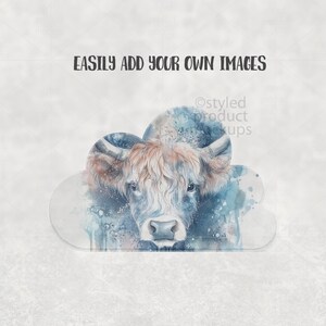 May include: A watercolor illustration of a Highland cow, featuring shades of blue, brown, and white. The cow is set against a cloud-shaped background. The text "EASILY ADD YOUR OWN IMAGES" is displayed at the top.