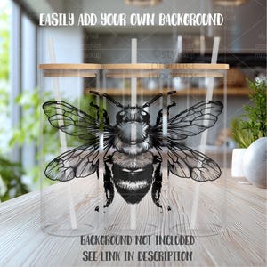 May include: Clear glass tumbler with a bamboo lid and a white straw. The tumbler features a detailed black and white illustration of a bee. Text on the image reads "EASILY ADD YOUR OWN BACKGROUND" and "BACKGROUND NOT INCLUDED SEE LINK IN DESCRIPTION."