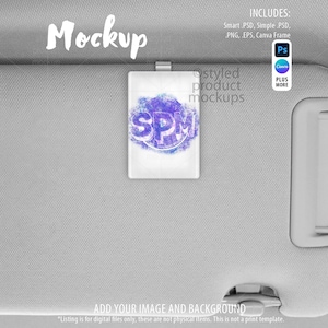 May include: A mockup image featuring a white rectangular product with a purple and blue design, clipped to a car visor. The word "Mockup" is written in white script. Includes Smart PSD, PNG, EPS, and Canva Frame.