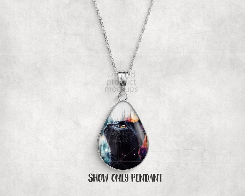 May include: A silver pendant necklace featuring a teardrop-shaped pendant with a black cat design. The cat's face is visible, set against a colorful, cosmic background. The text "SHOW ONLY PENDANT" is at the bottom of the image.