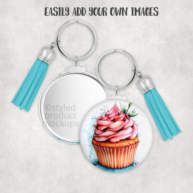 May include: Two round keychains with silver rings and turquoise tassels. One keychain features a watercolor cupcake design with pink frosting and a brown base. The other keychain is blank. The text "EASILY ADD YOUR OWN IMAGES" is at the top.