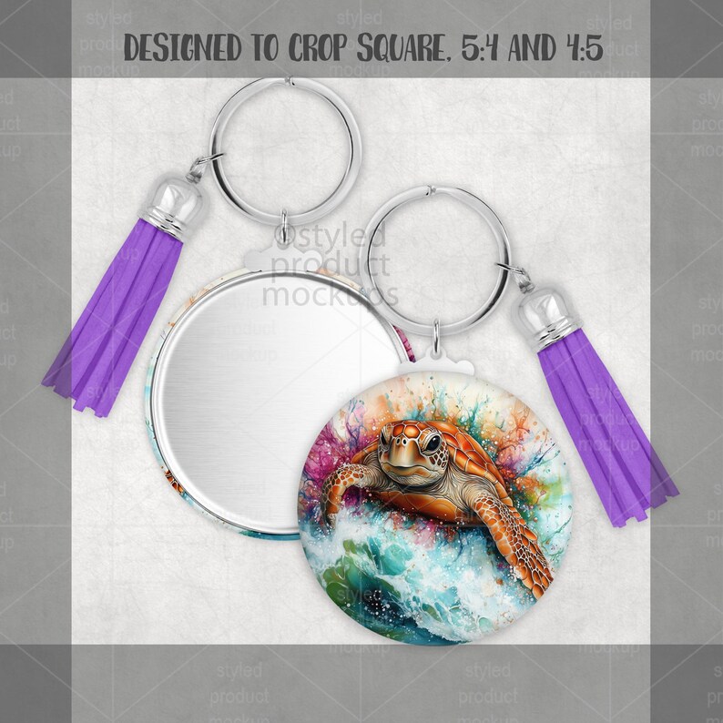 May include: A round keychain with a sea turtle design. The keychain has a silver ring, a purple tassel, and a mirror on the back. The sea turtle is brown and orange, with a colorful ocean background. The text "DESIGNED TO CROP SQUARE. 5:4 AND 4:5" is at the top.