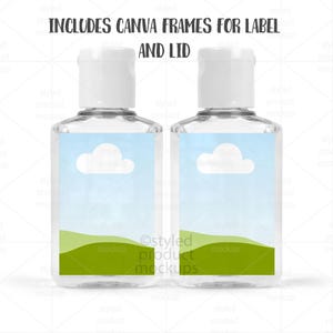 May include: Two clear, rectangular hand sanitizer bottles with white caps. Each bottle has a label featuring a blue sky with a white cloud and green hills. The text "INCLUDES CANVA FRAMES FOR LABEL AND LID" is at the top.