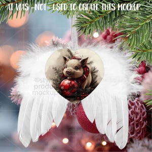 May include: A heart-shaped Christmas ornament featuring a pig wearing a scarf and hat, holding a red ornament. The ornament is surrounded by white feather wings and a red glitter ball. The text "AI WAS - NOT - USED TO CREATE THIS MOCKUP" is at the top.