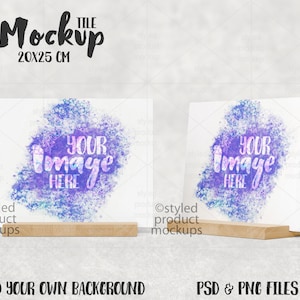 May include: Two white square tiles with a watercolor background in shades of purple and blue. The tiles are on wooden stands and have the text "YOUR IMAGE HERE" on them. The tiles are 20x25 cm.