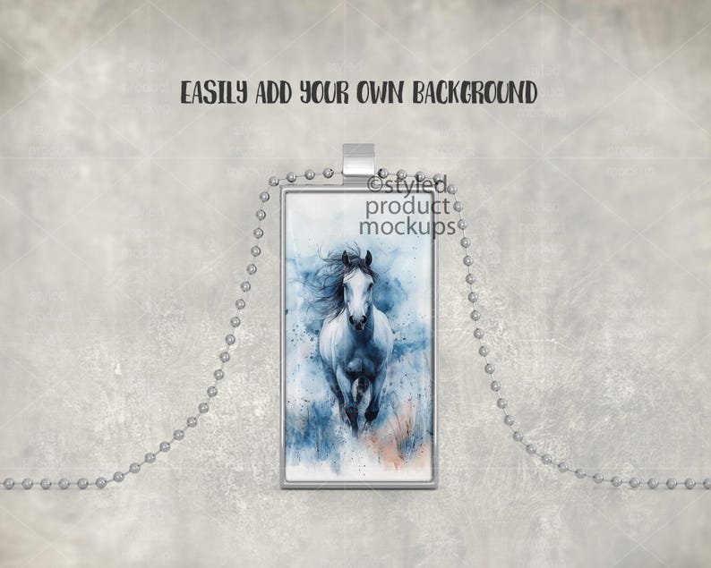 May include: A silver chain necklace with a rectangular pendant featuring a watercolor painting of a white horse running through a blue and white landscape.