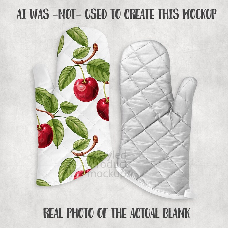 May include: White oven mitt with a cherry branch design, featuring red cherries and green leaves. The other mitt is solid white with a quilted pattern. Text on the image reads: AI WAS -NOT- USED TO CREATE THIS MOCKUP and REAL PHOTO OF THE ACTUAL BLANK.