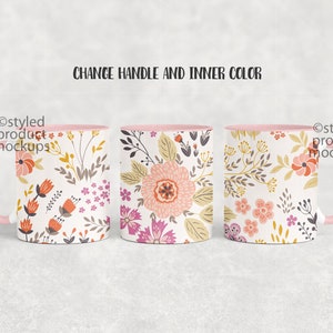 May include: Three white ceramic mugs with pink handles and rims. Each mug features a different floral pattern in shades of pink, orange, yellow, and green. The text "Styled product mockups" appears on the left and right sides of the image.