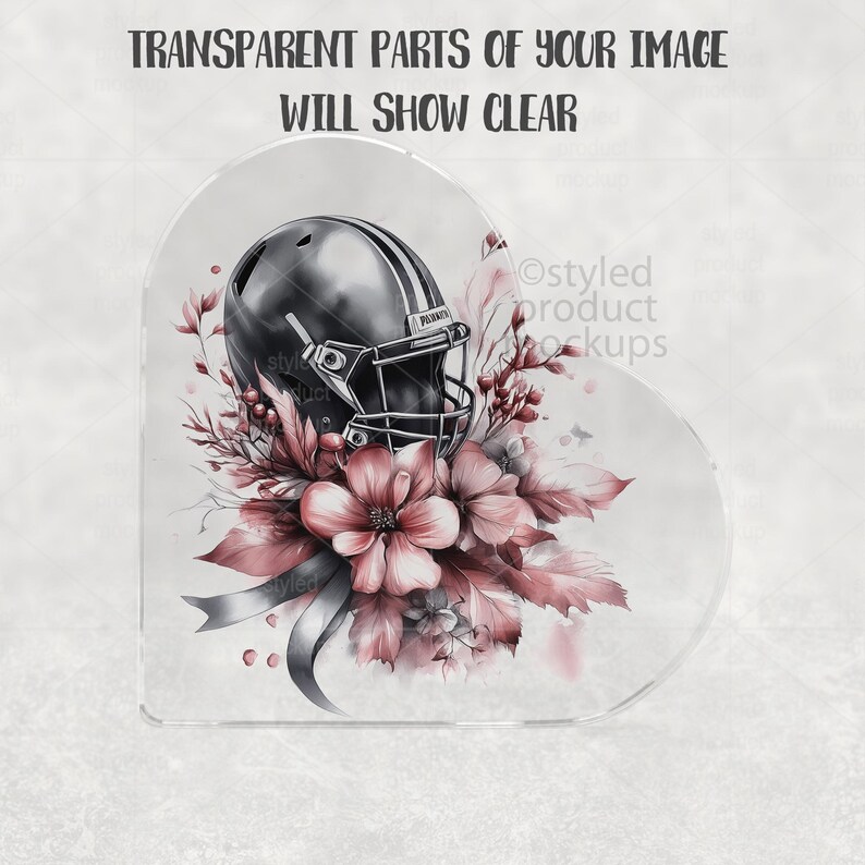 May include: A watercolor design featuring a football helmet with a floral arrangement. The helmet is black with white stripes, surrounded by pink flowers and foliage. The text at the top reads "TRANSPARENT PARTS OF YOUR IMAGE WILL SHOW CLEAR".
