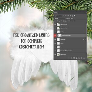 May include: A white angel wing ornament with a heart-shaped center, adorned with soft feathers. The ornament hangs from a silver ribbon, set against a blurred background with text: "PSD ORGANIZED LAYERS FOR COMPLETE CUSTOMIZATION". A digital interface is visible.