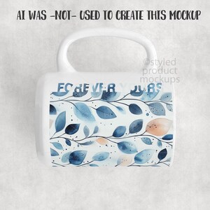 May include: White ceramic mug with a curved handle. The mug features a watercolor design of blue and peach-colored leaves and the words "FOREVER YOURS" in blue letters.