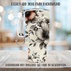 May include: A white tumbler with a floral design in shades of gray and peach. The tumbler has a silver keychain attached. The text "EASILY ADD YOUR OWN BACKGROUND" and "BACKGROUND NOT INCLUDED SEE LINK IN DESCRIPTION" are visible.