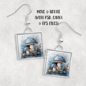 Pu&ograve; includere: Orecchini quadrati argentati con un disegno ad acquerello di funghi blu. Gli orecchini hanno una chiusura a gancio. Il testo "MOVE & ROTATE (WITH PSD. CANVA & EPS FILES)" &egrave; visibile.