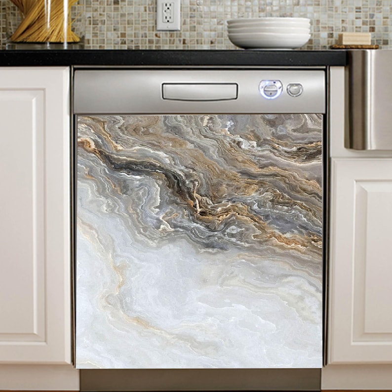 May include: A dishwasher with a decorative front panel featuring a marble-like design. The panel has a swirling pattern of white, gray, brown, and gold tones, creating a natural, textured appearance. The dishwasher is set against a kitchen backdrop.